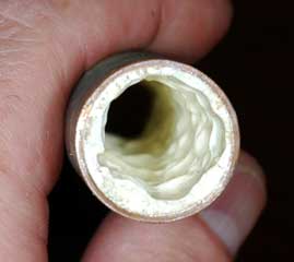 Pipe relining with a teflon inner paint is really not a repair. Here is a defective job.